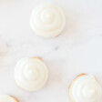 white champagne cookies on marble surface