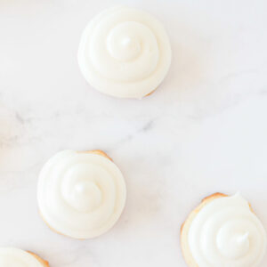 white champagne cookies on marble surface