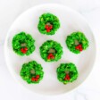 wreath cookies on white plate