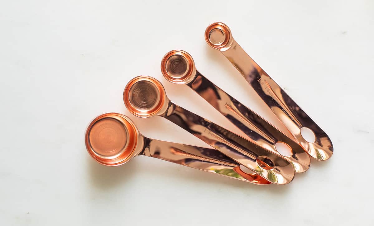 copper measuring spoons