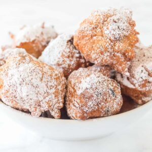 new years cookies piled high in white bowl