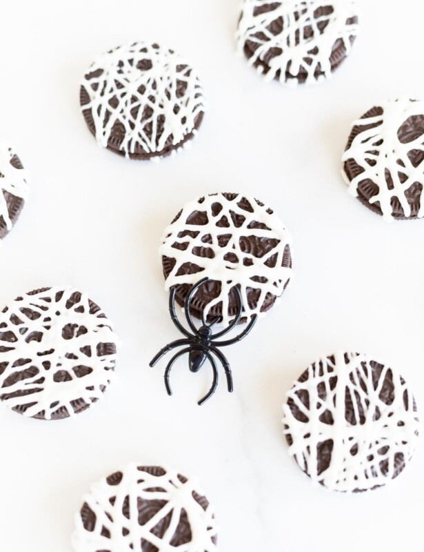 Spider cookies made from Oreos, on a white counter