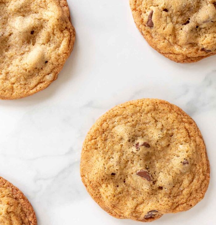 Thin Chocolate Chip Cookies on White Marble Counter
