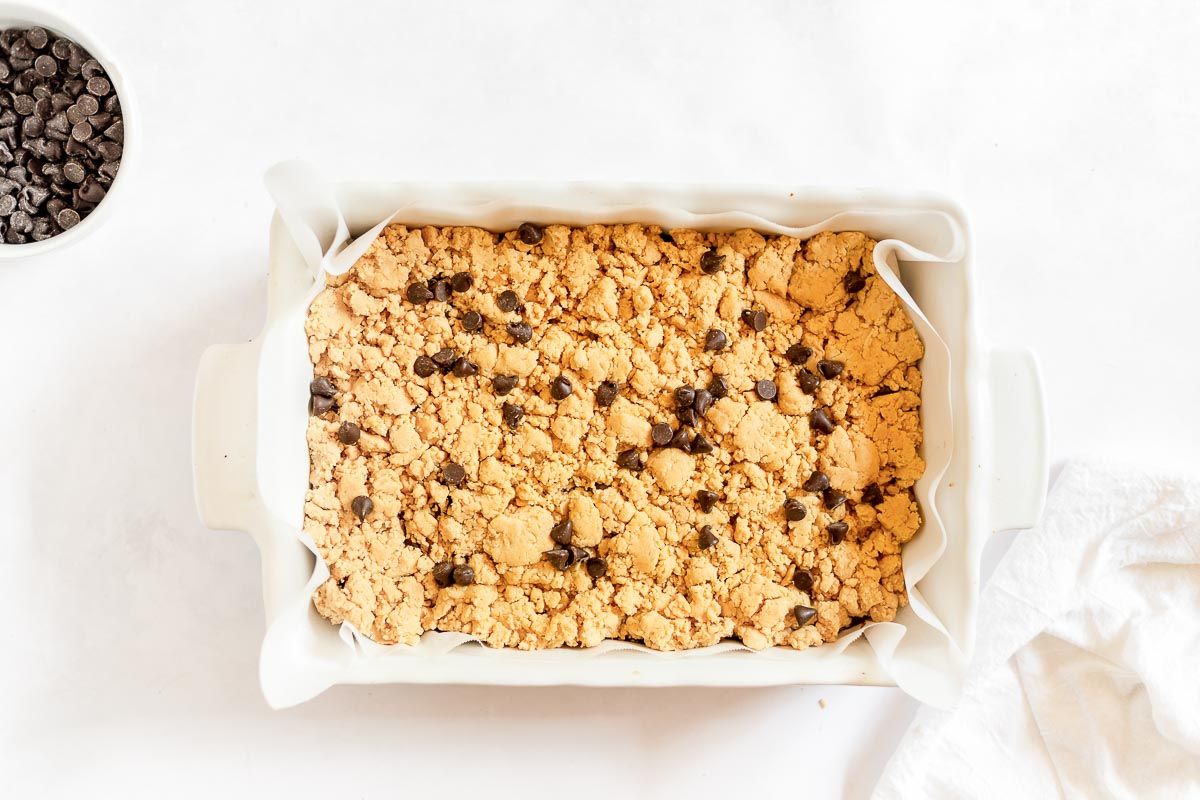 peanut butter brookie in a white baking pan