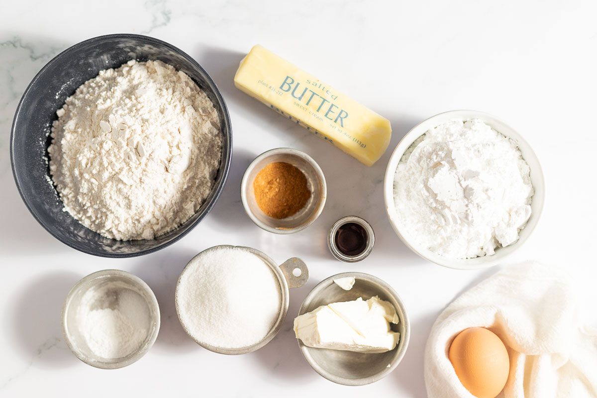 Cookie ingredients laid out on a white surface