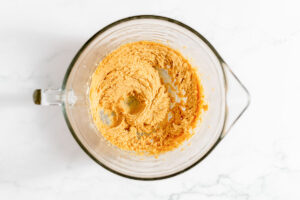 Overhead view of creamed butter, peanut butter, and sugar