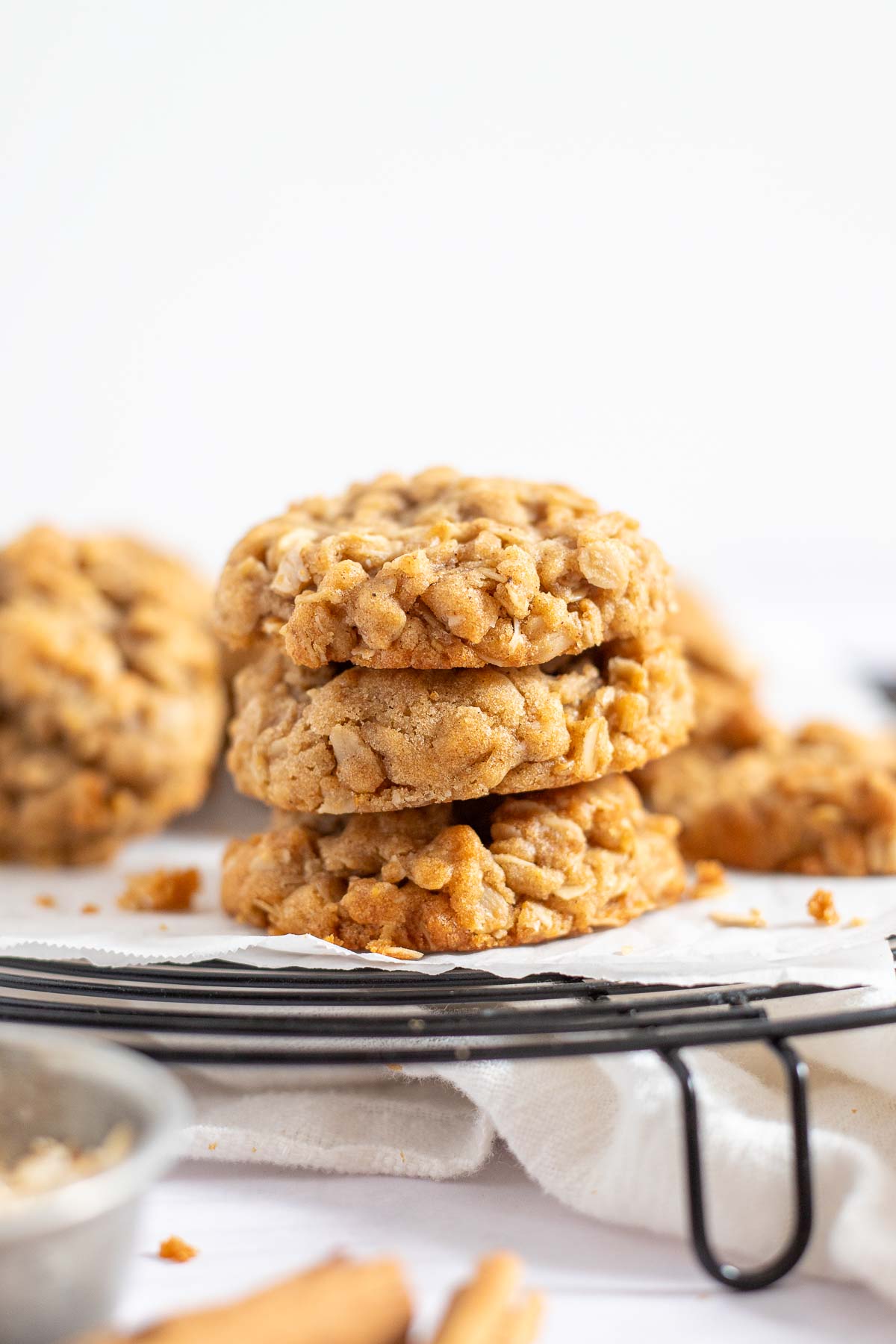 Stack of 3 oatmeal cookies without butter on wire rack